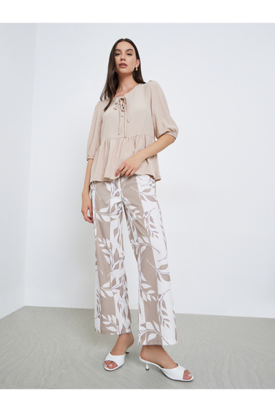 Take Two By Styli Ruffle Hem Half Sleeve Tops and Leaf Printed Pants Set