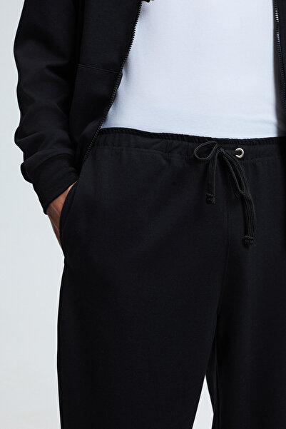 GRIMELANGE Griffin Men's Black Sweatpants with Elastic Waistband and Metal Bird's Eye Detail