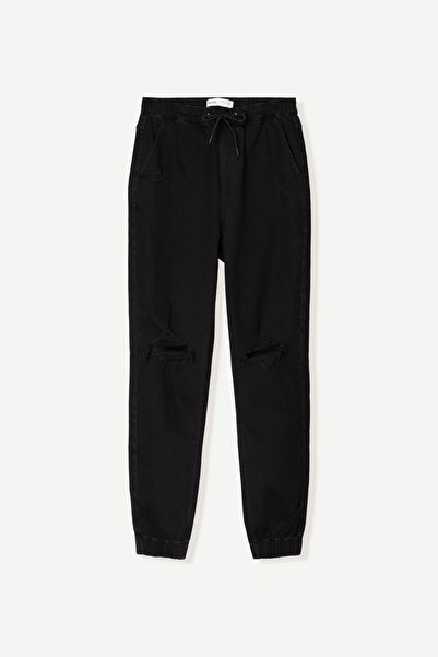 Bershka Ripped jogger jeans