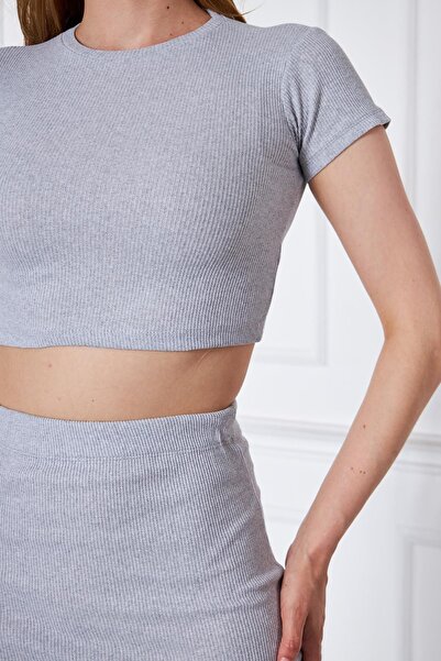 comstar Жіночий комплект з кроп-топом і спідницею з розрізом