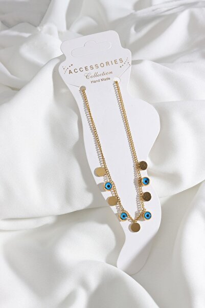 LA PERRY ACCESSORIES خلخال ذهبي من الفولاذ مع عين الشر وتفاصيل البولندية