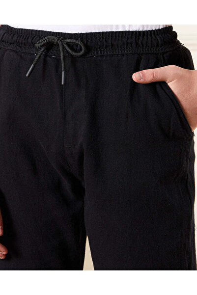 REDTAG Senior Boys Black Stretch Denim Jogger Jeans