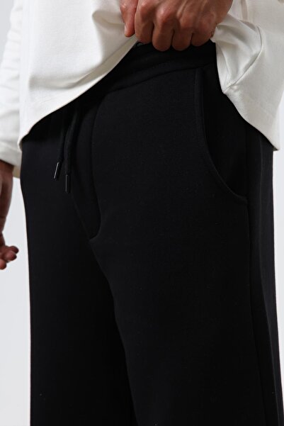 VAMOSCLO Πλενόμενο μαύρο παντελόνι φούτερ με φαρδύ κούρεμα