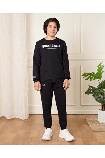 REDTAG طقم بنطال رياضي مطبوع أسود للأولاد الكبار (قطعتين)