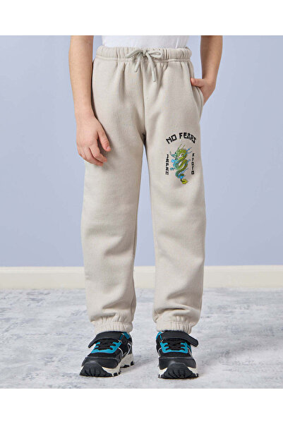 REDTAG بنطال رياضي مطرز باللون العاجي للأولاد