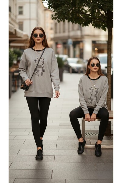 The سويت شيرت نسائي مطرز على شكل قطة – مقاس مريح بثلاث خيوط بدون شاردون، أسود ورمادي ميلانج