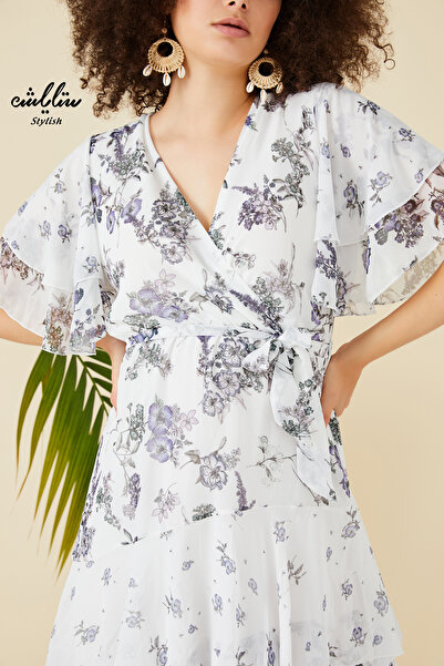 Stylish White floral v-neck midi dress with ruffle design