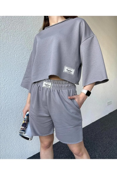 LUSHN طقم تي شيرت وشورت سفلي مطبوع للجنسين من Cappitone