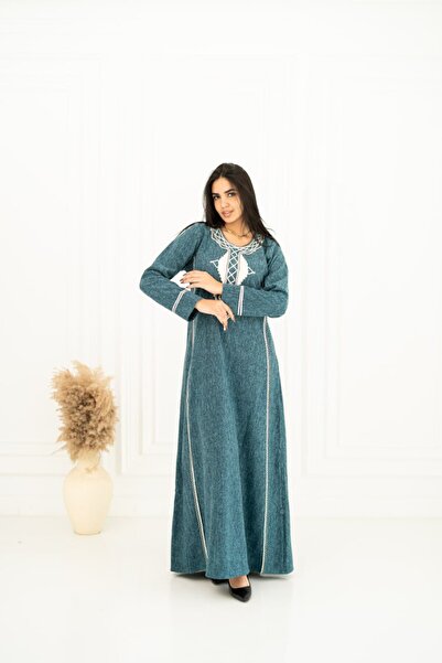 AFandina A stylish embroidered wool jalabiya that gives you a distinctive, warm, and irresistible elegance. ER-00336