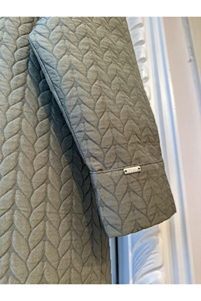 Invee Long Quilted Cap with Snap Closure