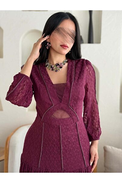 Opera Fashion Burgundy lace dress with a sophisticated, feminine cut