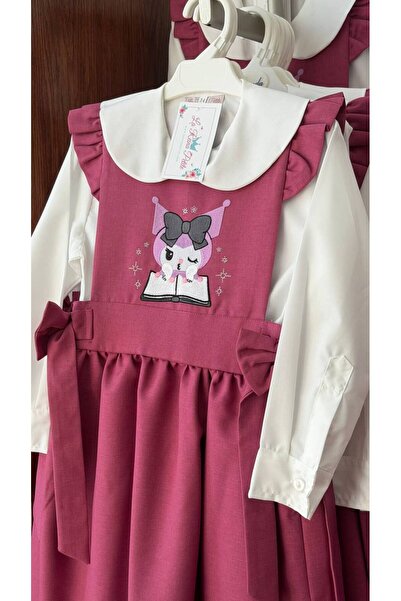 La reina petite Elementary school uniform, pink, with a white shirt featuring a chrome character embroidery.