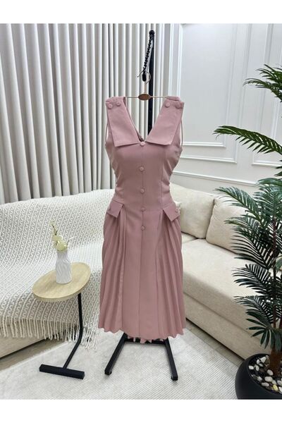 NARCISSUS FASHION Sleeveless dress with a large collar and front button closure