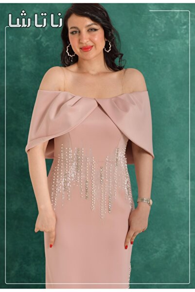 NATASHA Fashion The magic of the evening with a design that flows over the shoulders from Natasha.