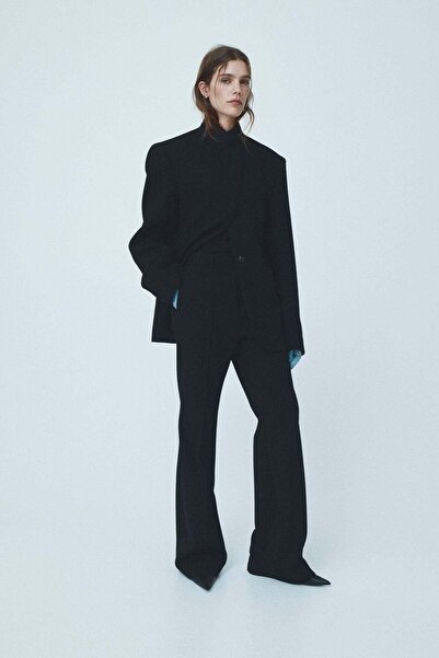 H&M بنطلون صوف مُصمم حسب الطلب