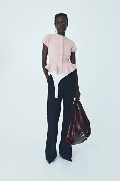 H&M بلوزة ببلوم محبوكة