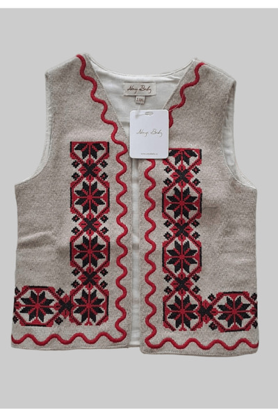 KidsMagazin Traditional cream vest with red elements