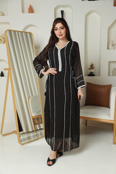 TREN A luxurious black women's jalabiya adorned with sparkling crystal beads ...