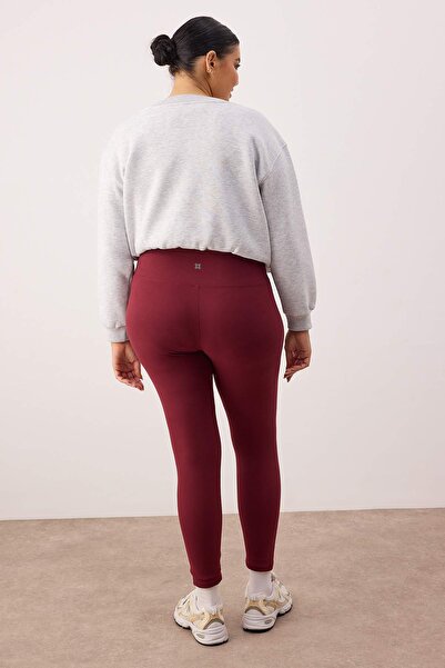 Trendyol Curve Πλεκτό αθλητικό κολάν πλήρους μήκους με λεπτομέρεια εκτύπωσης με ανακλαστήρες Claret Red Soft χνουδωτό ύφασμα TBBAW26BV00007