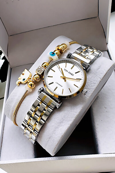 Tom Jones ساعة يد نسائية ذهبية اللون 3 ATM مقاومة للماء - سوار فولاذي Cbk368