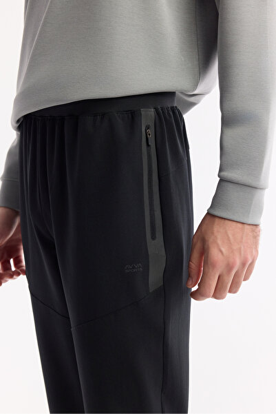 Avva Erkek Siyah Beli Lastikli Yandan Fermuarlı Cepli Flexi Baskı Detaylı Parçalı Teknik Kumaş Jogger A51