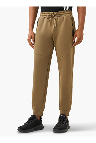 Kappa بنطال رياضي مطرز بشعار مع جيوب بسحاب ورباط للإغلاق