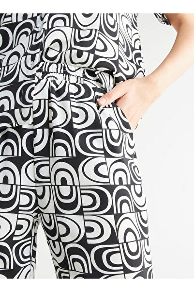 FAV All-over Print Wide Leg Pants With Elasticated Waistband And Pockets