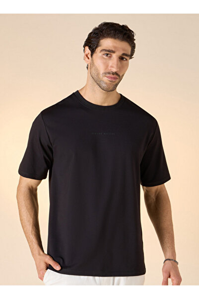 Iconic تي شيرت بياقة دائرية وأكمام قصيرة بتفاصيل طباعية مميزة