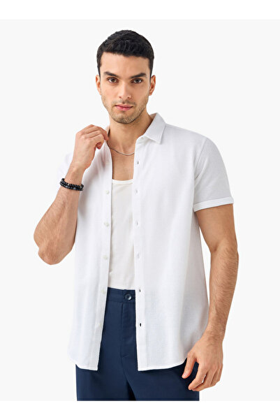 Iconic قميص منقوش بأكمام قصيرة وأزرار للإغلاق