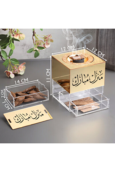 Story of candle An incense burner with a box of incense bearing the phrase "Blessed Home" and featuring Moroccan oud, made of glossy, transparent acrylic.