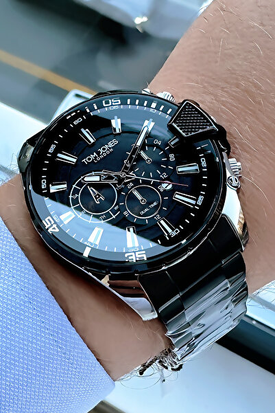 Tom Jones ساعة يد رجالية مقاومة للماء 3 Atm، سوار فولاذي أسود اللون TJEG2017C6