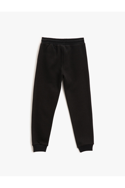 Koton Detailní potisk tepláků Jogger s kravatou v pase