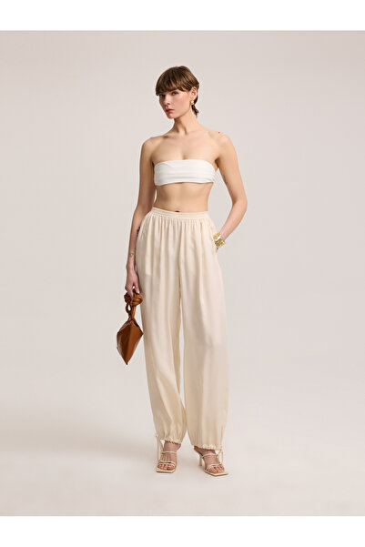 BAQA Open Beige Trousers with Lace-up Cuffs
