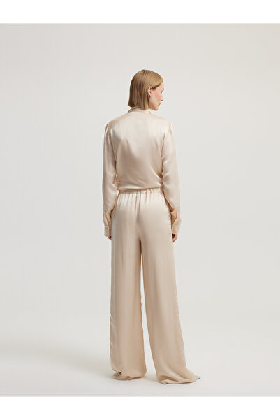 BAQA السراويل البيج التفاصيل الترتر