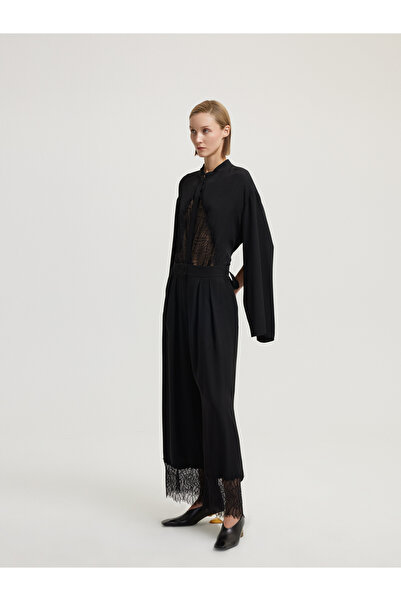 BAQA بنطلون أسود مع تفاصيل الدانتيل الساق
