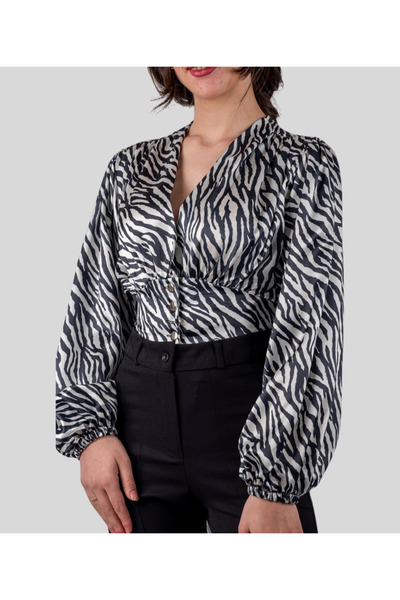 MQ بلوزة كروب توب بفتحة صدر على شكل V طباعة زيبرا