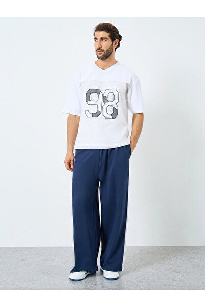 Styli Oversized Cut and Sew Panel Mesh T-Shirt
