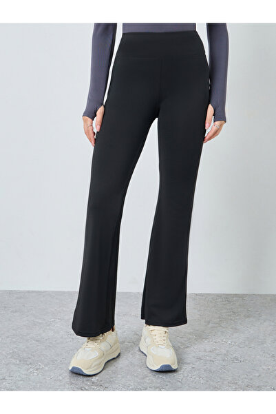 Styli Women Black Solid Plain Flared Leggings