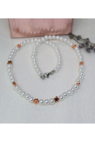 FARAA Handmade necklace with white pearls and gold stars "Starlight Glow"