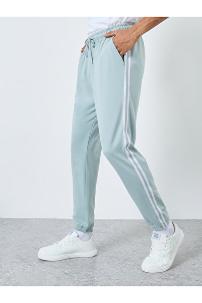 Styli بنطال رياضي رجالي قصة ضيقة من تيري مع شريط جانبي