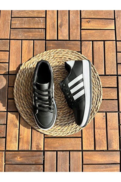 Nuzabi حذاء أرفو الرياضي باللونين الأسود والأبيض