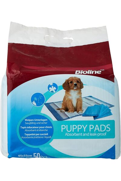 Bioline وسادات تدريب الجراء - 50 قطعة، ماصة ومضادة للتسرب، بيضاء