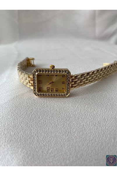 uyguntakıaksesuar ساعة يد نسائية ذهبية اللون بتفاصيل حجرية – مينا مستطيل، مود...