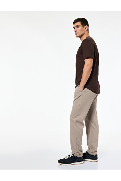 Koton Straight Fit Pike Fabric Pocket Detailed Relaxed Cut Waist Lace up Trousers