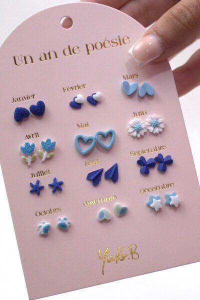 Yuko B 12 Pairs of Ceramic Earrings Set Year Themed Blue