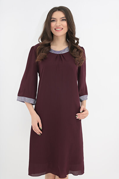 Vanessa Line RO Dark purple veil dress accessorized with lilac glitter