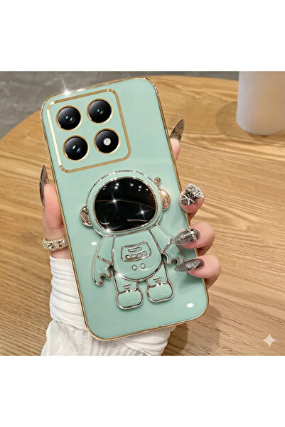 Rivor حافظة هاتف شاومي مي 14 تي برو بحواف لامعة ونقش ذهبي مع شكل رائد فضاء وح...