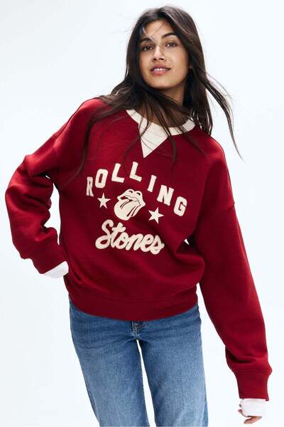 H&M سويت شيرت بتفاصيل نقوش