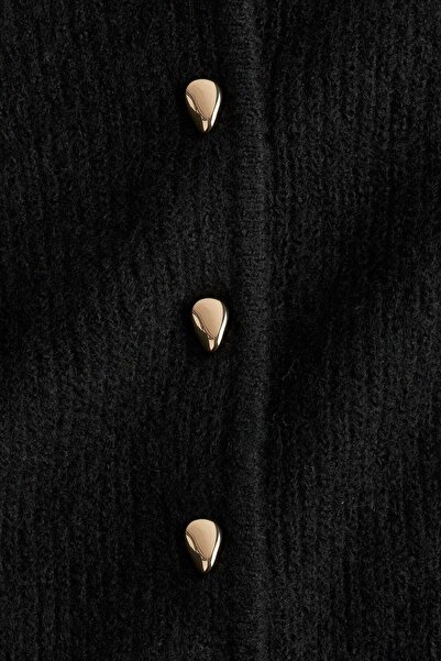 H&M Rib-knit peplum cardigan