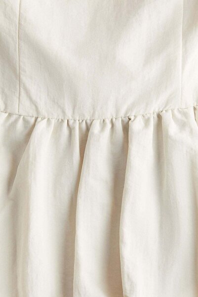 H&M فستان ببلوم باندو